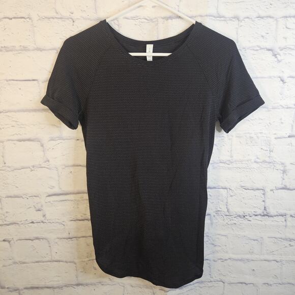 lululemon athletica Tops - Lululemon Black/Gold Open Tie Back Shortsleeved Top Womens Sz 2